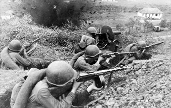 Red army men fighting for a village in the northern caucasus, 1942.