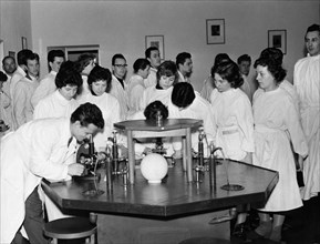 Medical students at the laboratory of the department of microbiology at the medical academy in bialystok