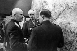 World war 2, marshal of the soviet union, ivan konev (konyev), commander of the troops of the first ukrainian front, confering with american general omar bradley in 1945.