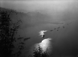 Boats on the chia-ling river, a tributary of the yangtze river in szechuan province, china, 1950s.