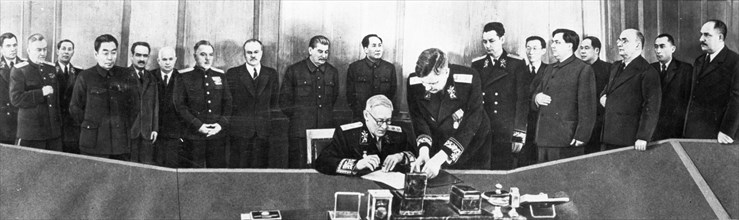 A,y, vishinsky signing the treaty of friendship, alliance, and mutual assistance between the soviet union and the chinese people's republic in 1950, (left to right: a,a, gromyko, n,a, bulganin, n,v, r...