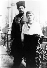 Russian emperor nicholas ll and his son alexei in tsarskoye selo, near petrograd in 1915, this photo was taken by empress alexandra fyodorovna.