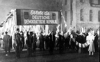 A mighty demonstration was held in berlin in the evening of october 11, 1949 on the occasion of the foundation of the gdr on october 7, 1949, the demonstration was led by members of the free german yo...