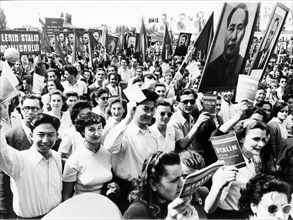 Students with mao's portrait in the may day demonstration in bucharest, in 1952.