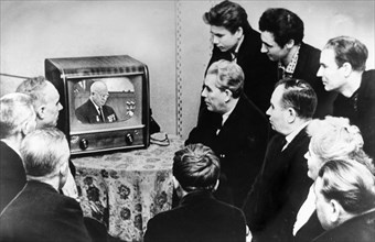 Workers of the state bearing plant no, 1 in moscow, watching nikita khrushchev give a report at the ussr supreme soviet on the present day international situation and the foreign policy of the soviet ...
