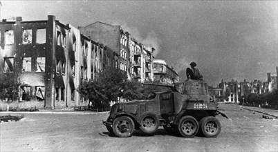 World war 2, battle of stalingrad, a soviet armored car in a stalingrad street, october 1942.