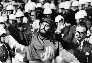 Fidel castro of cuba with president salvador allende upon his arrival at pudahuel airport in santiago on november 10, 1971.