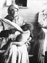 Famine, soviet union, a child dying of hunger, volga region, 1921-22.