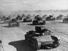 A formation of soviet t-26 model 35 light tanks during military maneuvers, 1936.