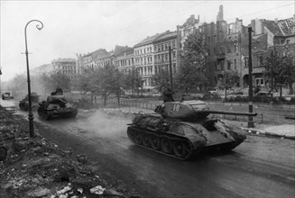 Soviet t-34 tanks on a street in berlin, may 1945, world war 2, fall of nazi germany.