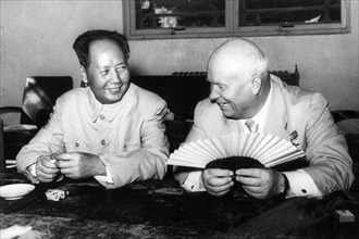 N, s, khrushchev and mao tse-tung (zedong) chatting in an airport waiting room in peking, 1957.