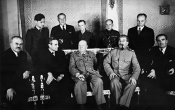 3rd moscow conference, seated, left to right: v,m, molotov, w, harriman, winston churchill, j,v, stalin, anthony eden, standing: v,m, berezhkov, sir archibald kerr, v,n, pavlov, a, birse, f, gusev, oc...