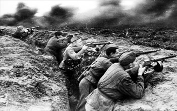 Red army guardemen firing at the enemy on the western front, during world war ll.