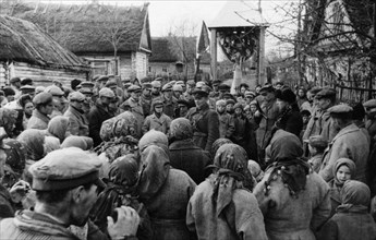 Partisans holding a meeting devoted to the 26th anniversary of the october revolution in a village in western byelorussia, world war 2.