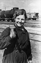 Nina shmeleva, the first woman working as a railshoe-brakeman at the leningrad railroad yards, ussr, 1940.