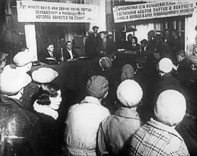 A party meeting at the 'paris commune' plant in moscow during the campaign to cleanse the communist party of hostile elements, september 1933.