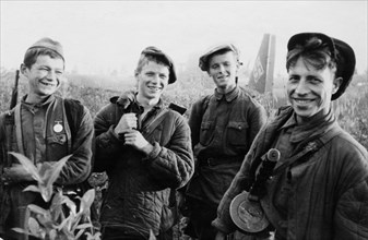 Four young partisans who just set fire to a junkers-52, a german transport plane that made a forced landing, world war 2.