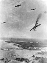 German plane being shot down by soviet fighter planes during a dogfight on the northwestern front.