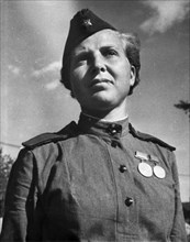 World war 2, a,a, dneprovskaya, a famous scout and heroine of the leningrad front, is secretary of the battalion committee of the young communist league.