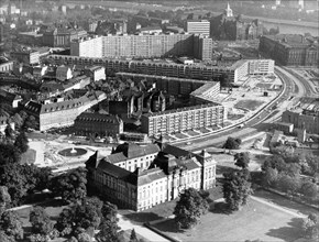 An aerial view of dresden, gdr featuring newly built residential blocks as well as reconstructed historical buildings, 1980.