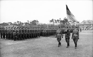 The first regiment of the national people's army of the gdr was festively sworn in on april 30, 1956.