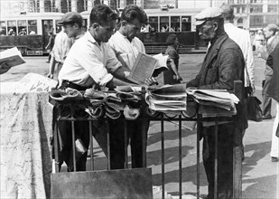 A news vendor in moscow, 1935.