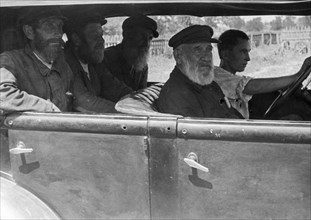 A jewish kolkhoz in stalindorf - national jewish district, ukraine, ussr, on the jewish kolkhoz 'combine', the oldest and most experienced collective farmers are leaving for the fields to act as inspe...