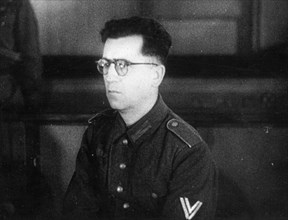 World war 2, december 15, 1943, still from a film on the kharkov trial produced by artkino, senior corporal of the auxiliary police, reinhard retzlaw, an officer of the 560th group of the german secre...