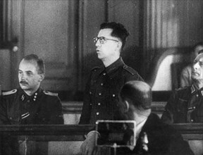 World war 2, december 18, 1943, still from a film on the kharkov trial produced by artkino, reinhard retzlaw making his last plea, he asked for mercy because he was under military orders when he commi...