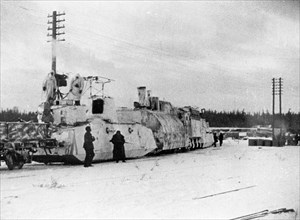 Soviet-finnish war, 1939-1940, a finnish armored train captured by the red army, the near car has light field guns, machin-guns, and wireless, the far car is the locomotive, a still from the newsreel ...