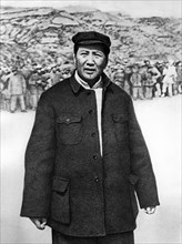Chairman mao at the drill grounds in yenan in 1944.