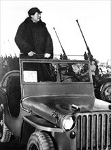 Chairman mao reviewing pla forces ay hsiyuan airfield on the outskirts of peking in march 1949.