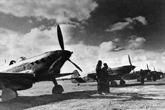 World war 2, soviet air force yakovlev yak fighters lined up on an airfield.