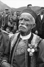 World war 2, rade dedich, an old soldier of the yugoslavian army, decorated for service in world war 1 against germany and austro-hungary, he is now in the yugoslavian guerilla army fighting the germa...