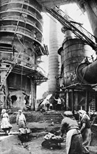 World war 2, soviet civilians, many of them women, restoring the foundry shop of the 2nd blast furnace of the petrovsky plant in dniepropetrovsk.