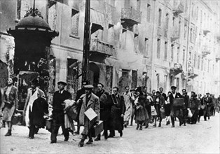 World war 2, residents of the warsaw ghetto on the way to a death camp, poland early 1940s.