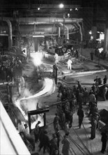 The first pouring of steel from the lenin steel mill's big furnace on the 10th anniversary of poland's liberation, nowa huta, poland, july 24, 1954.