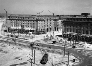 The final stages of construction of the central square in nowa huta, a new town near krakow being built in poland, june 1955.