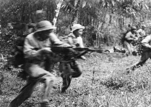 Tet offensive, national front for the liberation of south vietnam, viet cong soldiers charging the enemy in south vietnam, 1968.