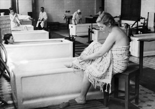 Soviet health spa, patients taking sulphur baths at the institute of balneotherapeutics, a health resort in the center of moscow, july 1947.