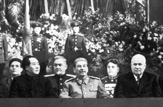 Communist leaders from two continents at the bolshoi theater in moscow at a meeting in honor of josef stalin's 70th birthday on december 21, 1949, (left to right: suslov, mao zedong, bulganin, stalin,...