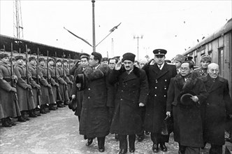 The north korean government delegation passing the honor guard at yaraslavl station upon their arrival in moscow, 1949(?), (left to right: kim il sung, a,i, mikoyan, a,a, gromyko, pak heun yung (pak h...