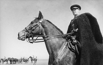 Commander of a cossack unit watching the progress of his troops on the south-western front, may 1942.
