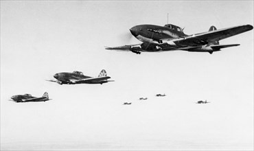 A squadron of soviet ilyushin 2 stormovik bombers in flight, world war 2.