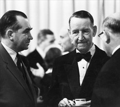 Us ambassador llewellyn thompson with nikolai blokhin (left) at the friendship house in moscow during a memorial meeting in honor of franklin delano roosevelt's 80th birthday, february 1962.