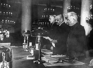 Nikolai shvernik reading the sentence handed down by the supreme court at a trial of menshevik counter-revolutionaries in moscow, 1931.