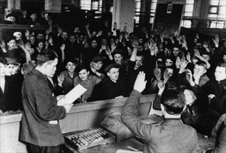 Show trials, workers of the dynamo works named after kirov voting to adopt a resolution demanding the execution of trotskyist spies, 1937.