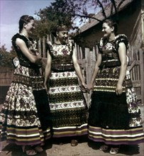 Women in traditional folk costumes of mezokovesd, hungary, 1950s.