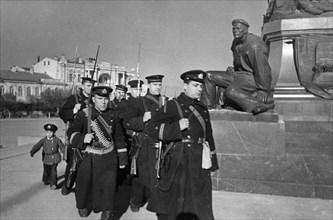 World war 2, defense of sevastopol, a little 'hero' seeing off red navy men to the advanced lines, april 1942.