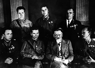 Moscow, october 7, 1939, chairman of the presidium of the ussr supreme soviet mikhail kalinin awards heroes of the battles on the khalkhin-gol river, from left to right: heroes of the soviet union s, ...